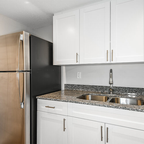 Kitchen furnished with stainless steel appliances